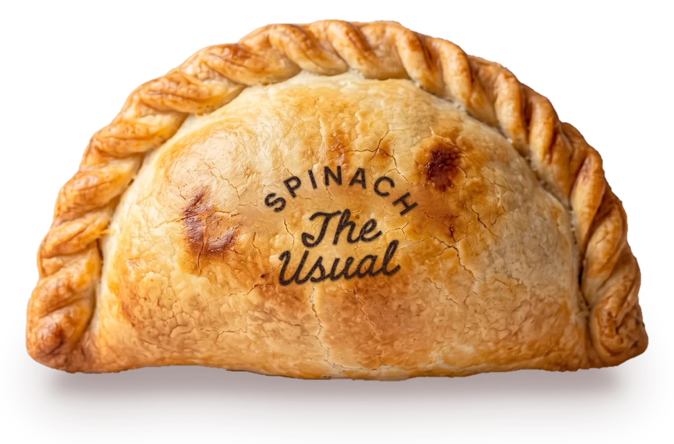 Spinach Empanada, golden and rope-crimped, stamped SPINACH, The Usual