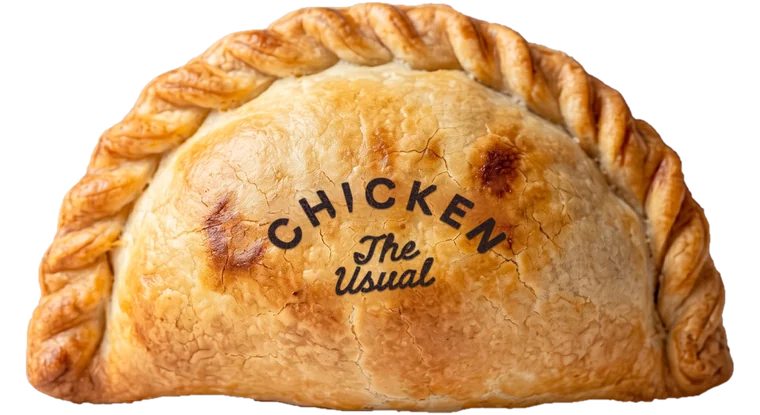 One real golden baked empanada, stamped CHICKEN, among drawn ones